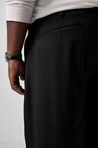 Plus size veliki brojevi Hlače poslovne širokog kroja s faltama i džepovima za punije